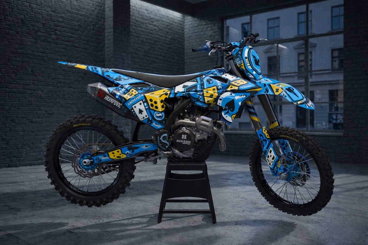 Custom dirt bike graphics in blue casino theme with dice and card icons.