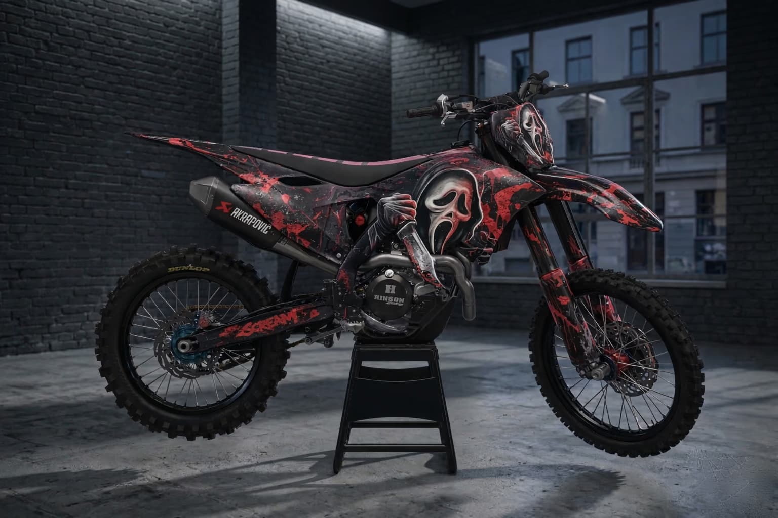 Custom dirt bike graphics with scream mask artwork in red and black race style.